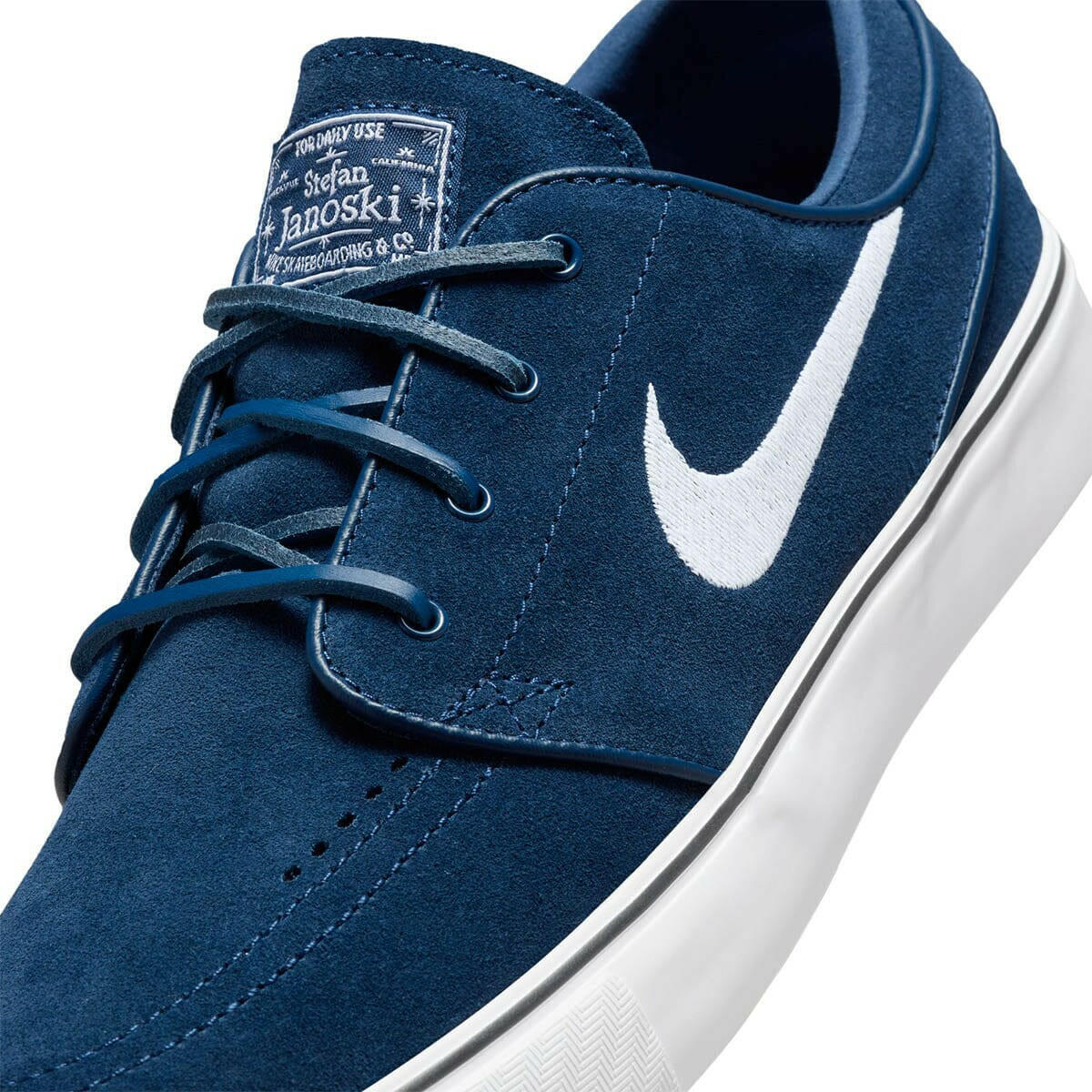 navy blue nike janoski