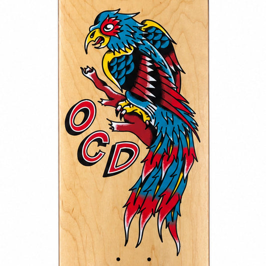 Close-up of Indi Giblin Tattoo parrot artwork and OCD lettering on the natural wood shop deck